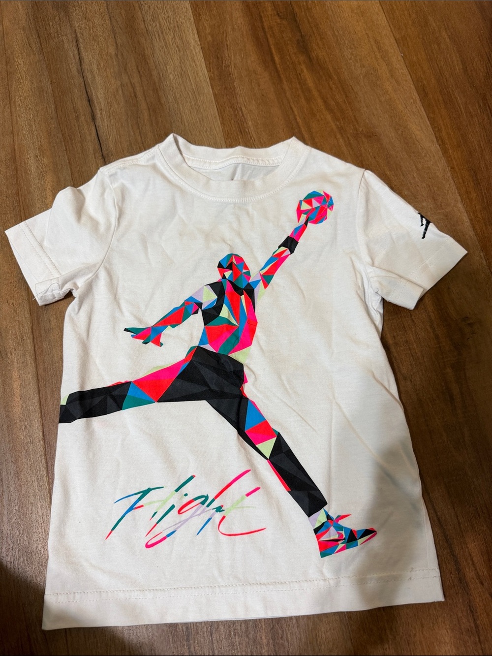 Jordan White Tee with Multicolor Geometric Jumpman